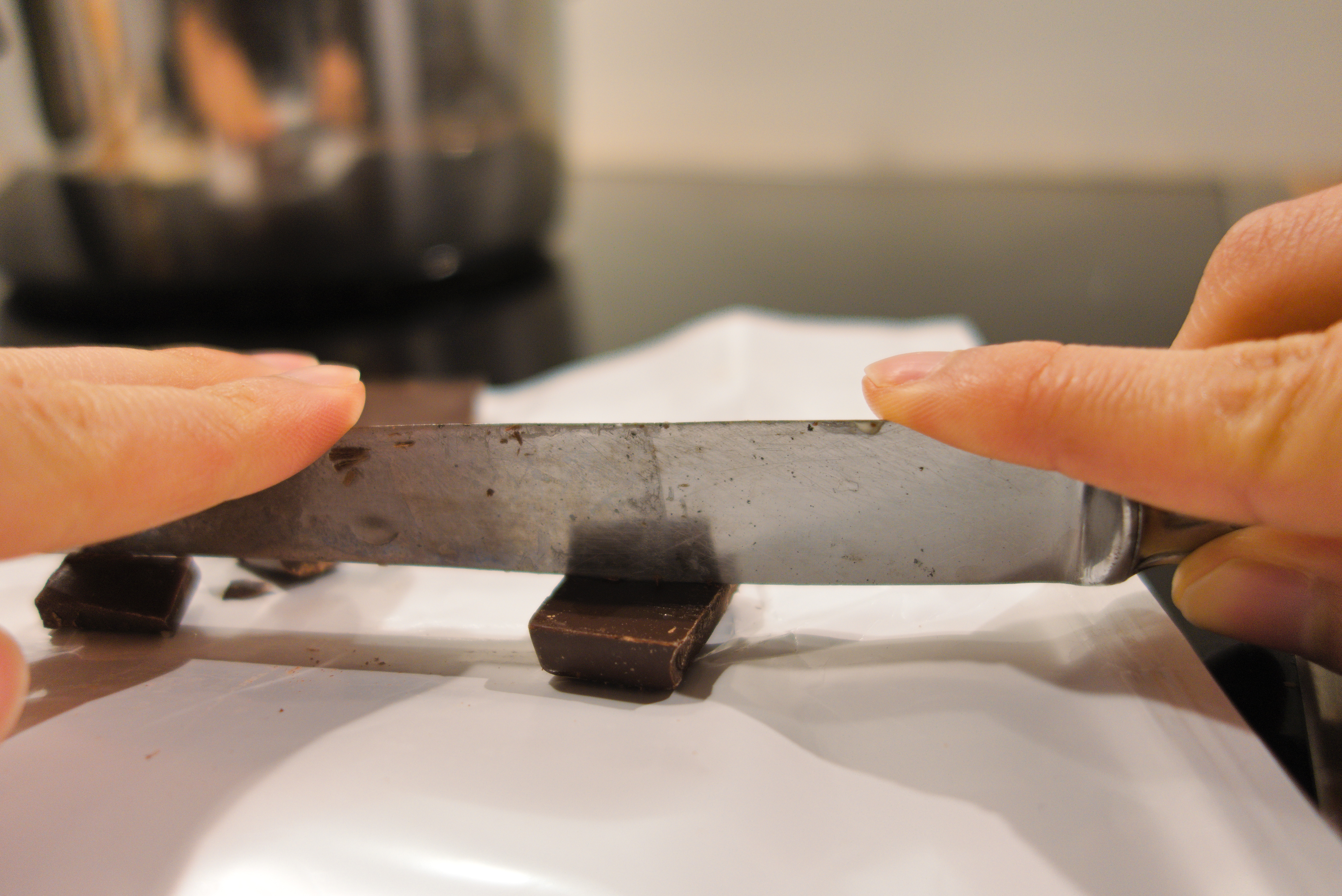 See-saw method of chopping dark chocolate